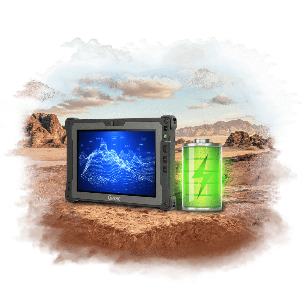 Rugged Getac tablet with a blue data display beside a large green battery on a rocky desert landscape.